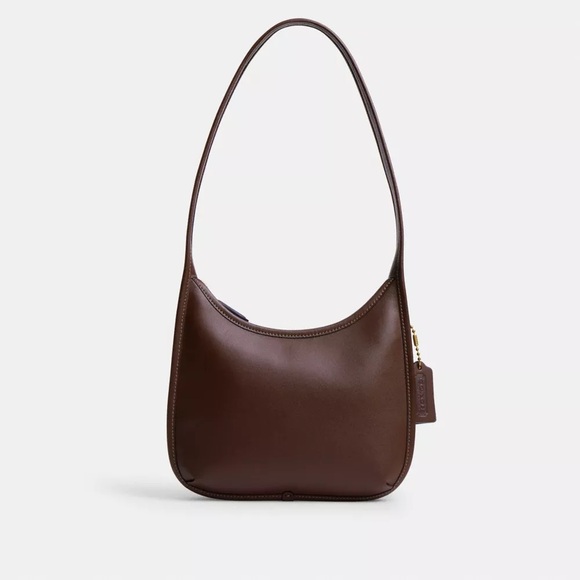 Coach Handbags - Coach curve zip bag